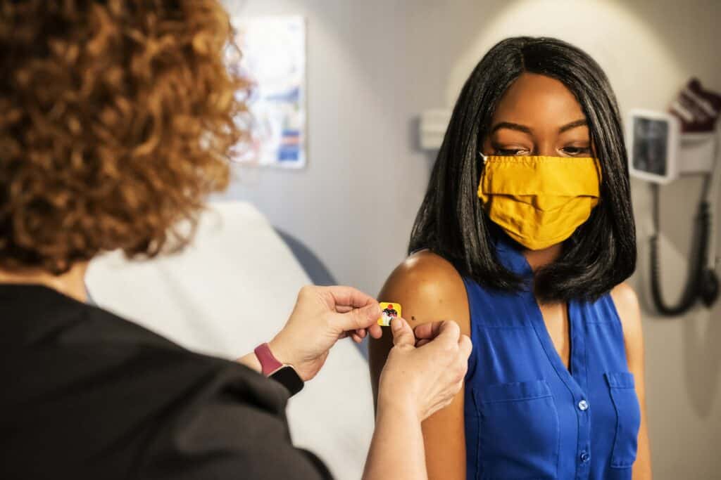 Woman recieving a flu vaccine